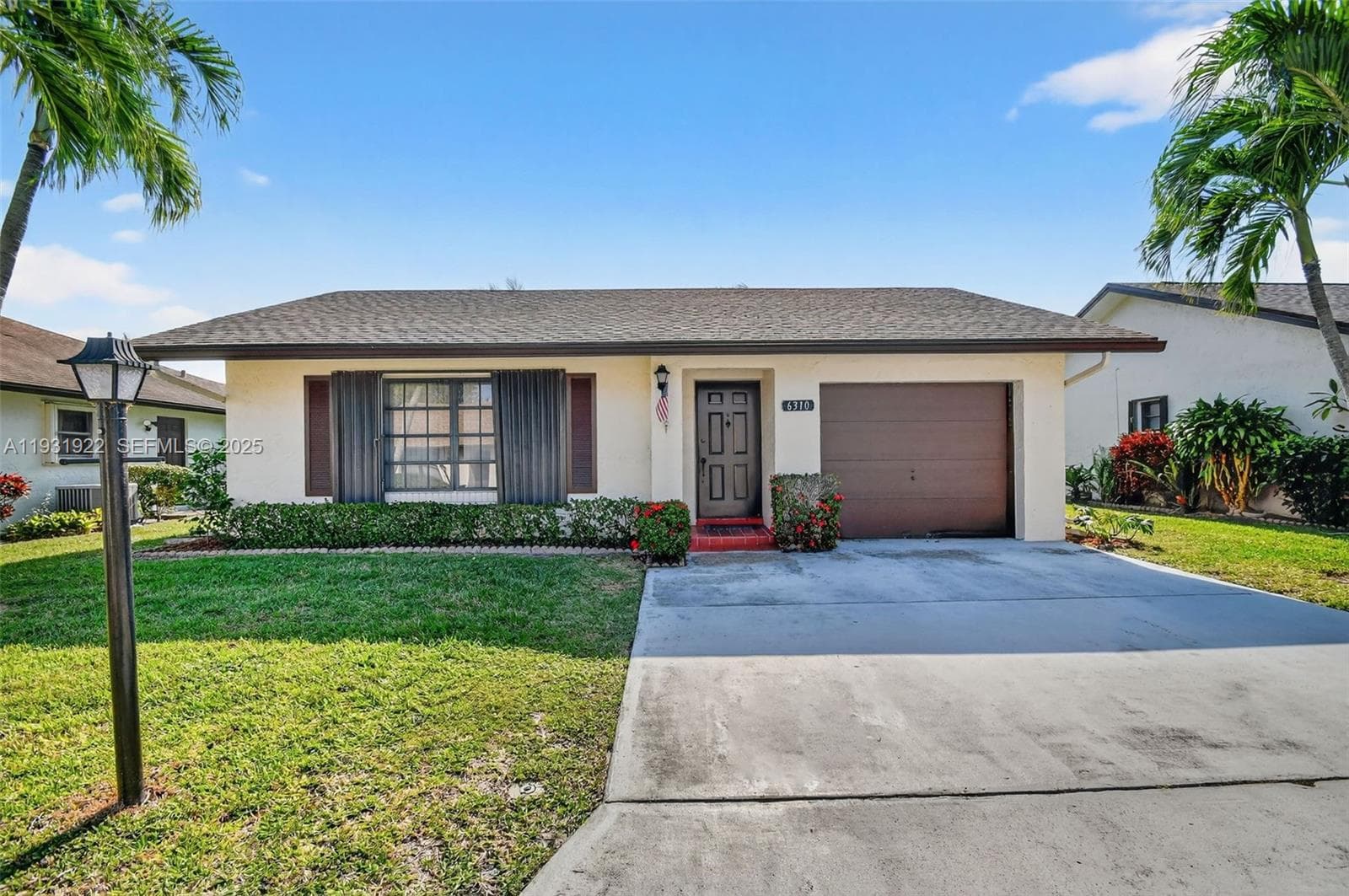 6310 Tall Cypress Cir, Green Acres FL 33463